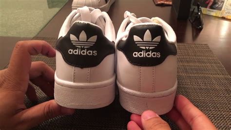 adidas ozweego original vs fake|real vs fake Adidas.